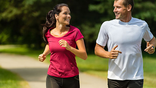 Husband and Wife out on a jog follow health advice from Sandpoint chiropractor