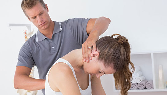 Woman receiving chiropractic adjustment from a Sandpoint chiropractor
